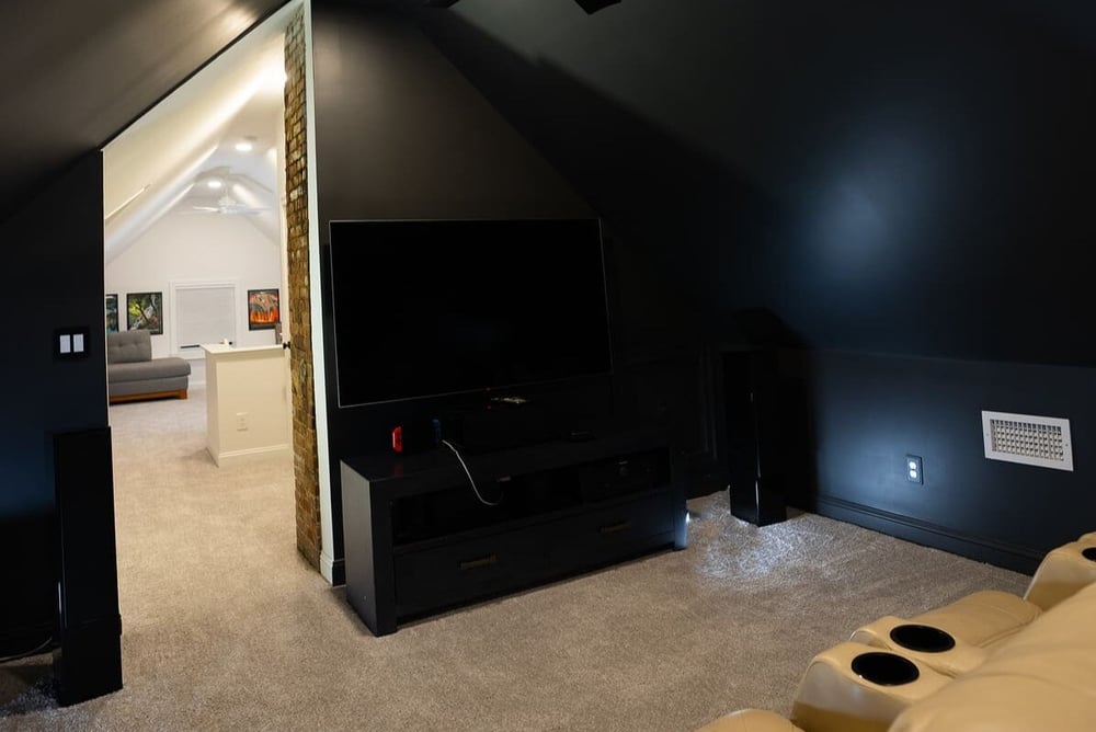 Black painted walls in finished attic remodel in Portsmouth, NH by Oxland Builders