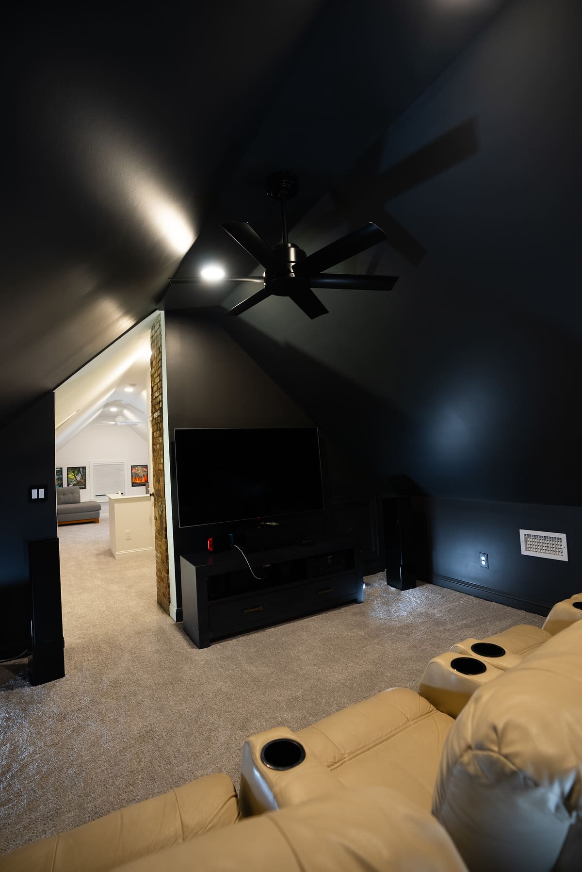 Black painted walls in finished attic remodel in Portsmouth, NH by Oxland Builders