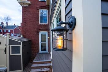 Exterior of light on home siding in NH by Oxland Builders