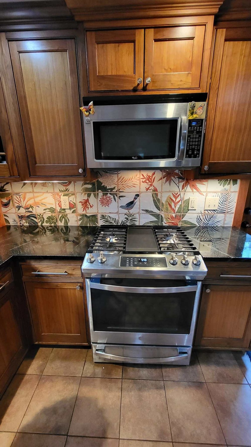 Floral kitchen tile backsplash with task lighing in New Hampshire kitchen remodel