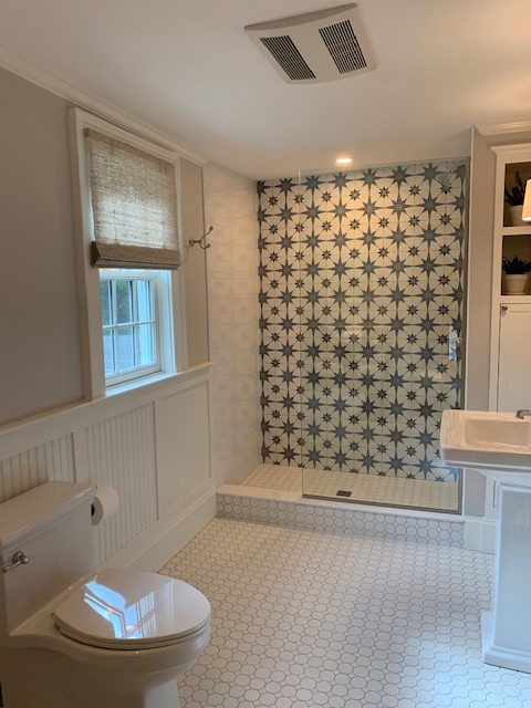 New Hampshire Bathroom Remodel with Walk-In Shower Behind Glass Panel