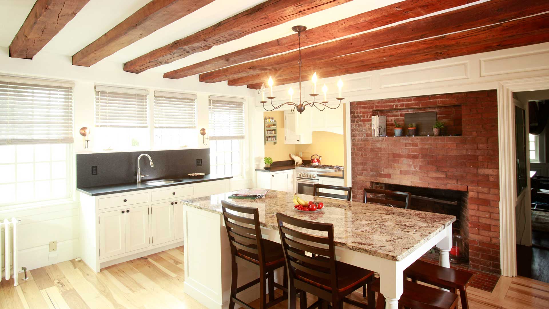 rustic kitchen addition with beamed ceiling