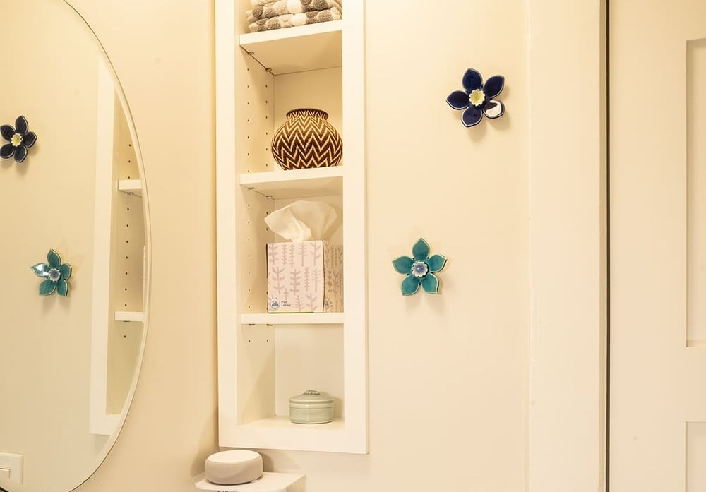 Small bathroom remodel in Seacoast, NH with towel bar and built in shelf