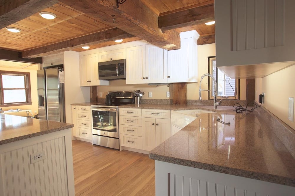 Cottage-style kitchen remodel with coffered ceiling and recessed lighting