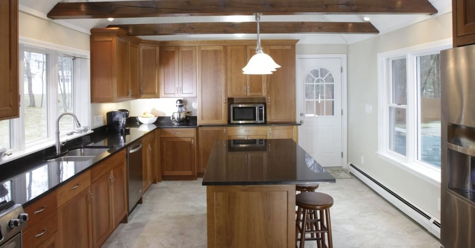 Kitchen with custom wood shaker cabinets in addition