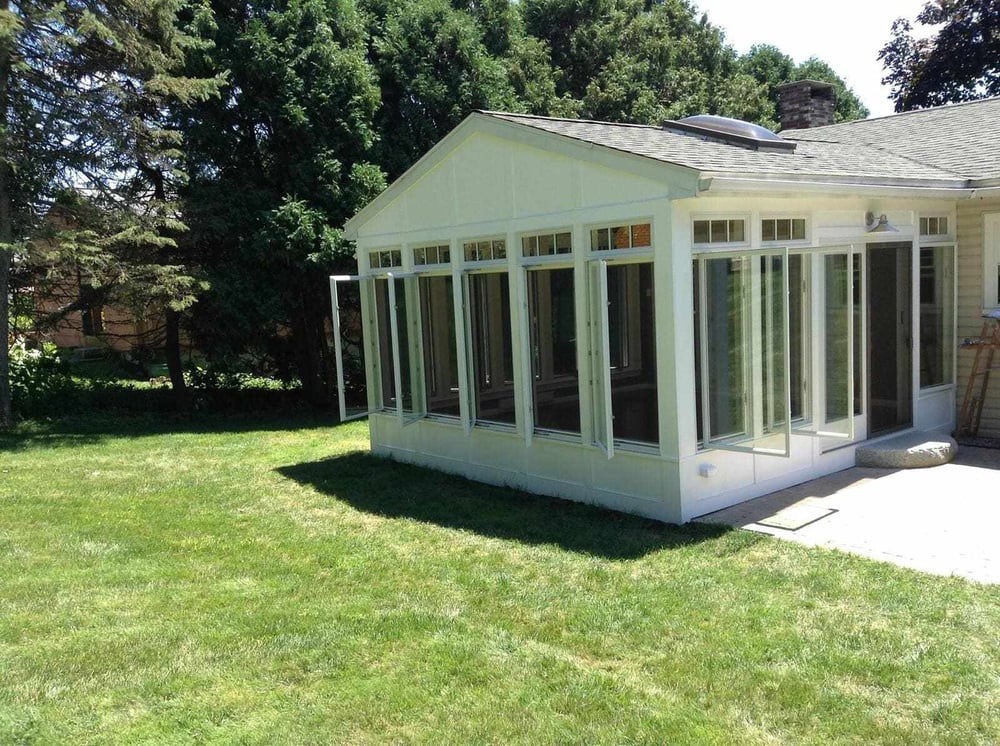 sunroom-addition-exterior-with-open-windows