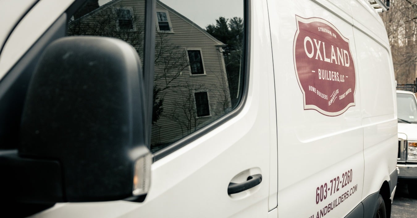 View of Oxland Builders truck in driveway