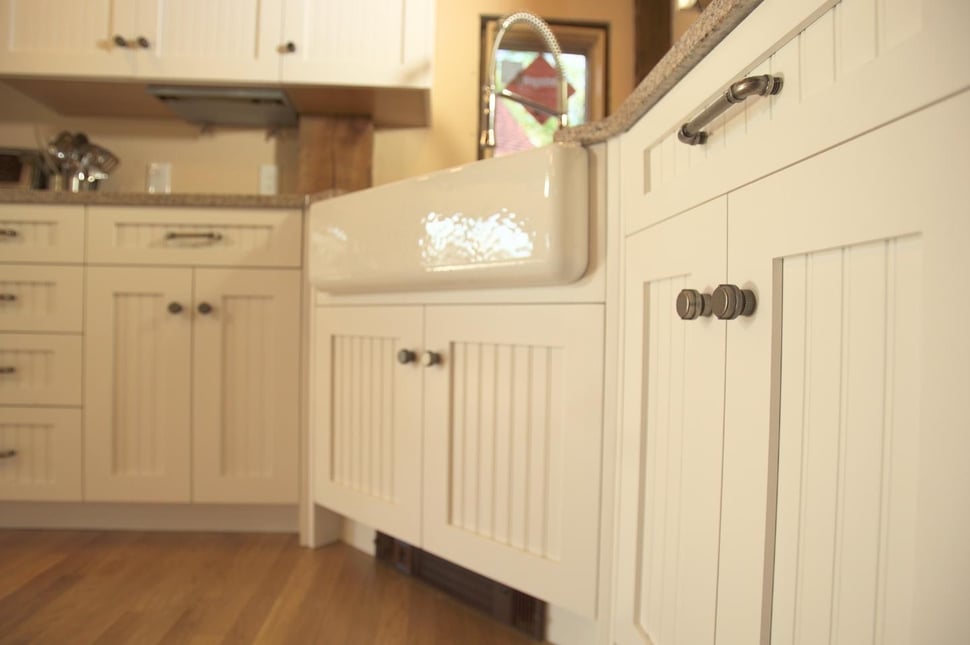 white kitchen cabinets with undermount kitchen sink